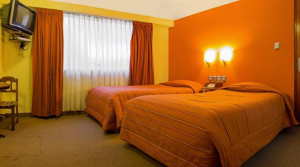 Mosoq Inn Puno Værelse billede
